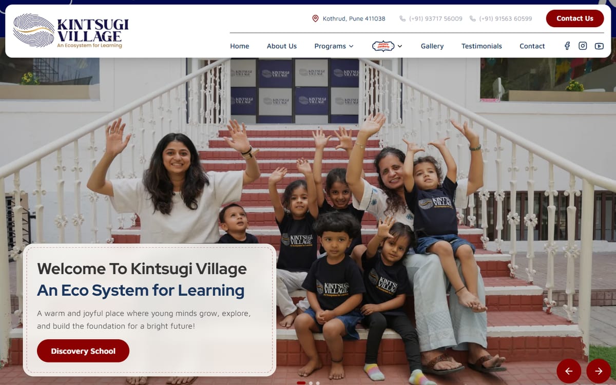 Kintsugi Village homepage: “Welcome To Kintsugi Village, An Eco System for Learning” over a photo of two teachers and young children waving on the school steps